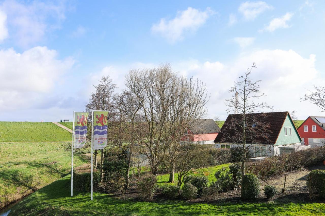 Casa de Férias Vakantiewoning 114 In Villapark De Oesterbaai